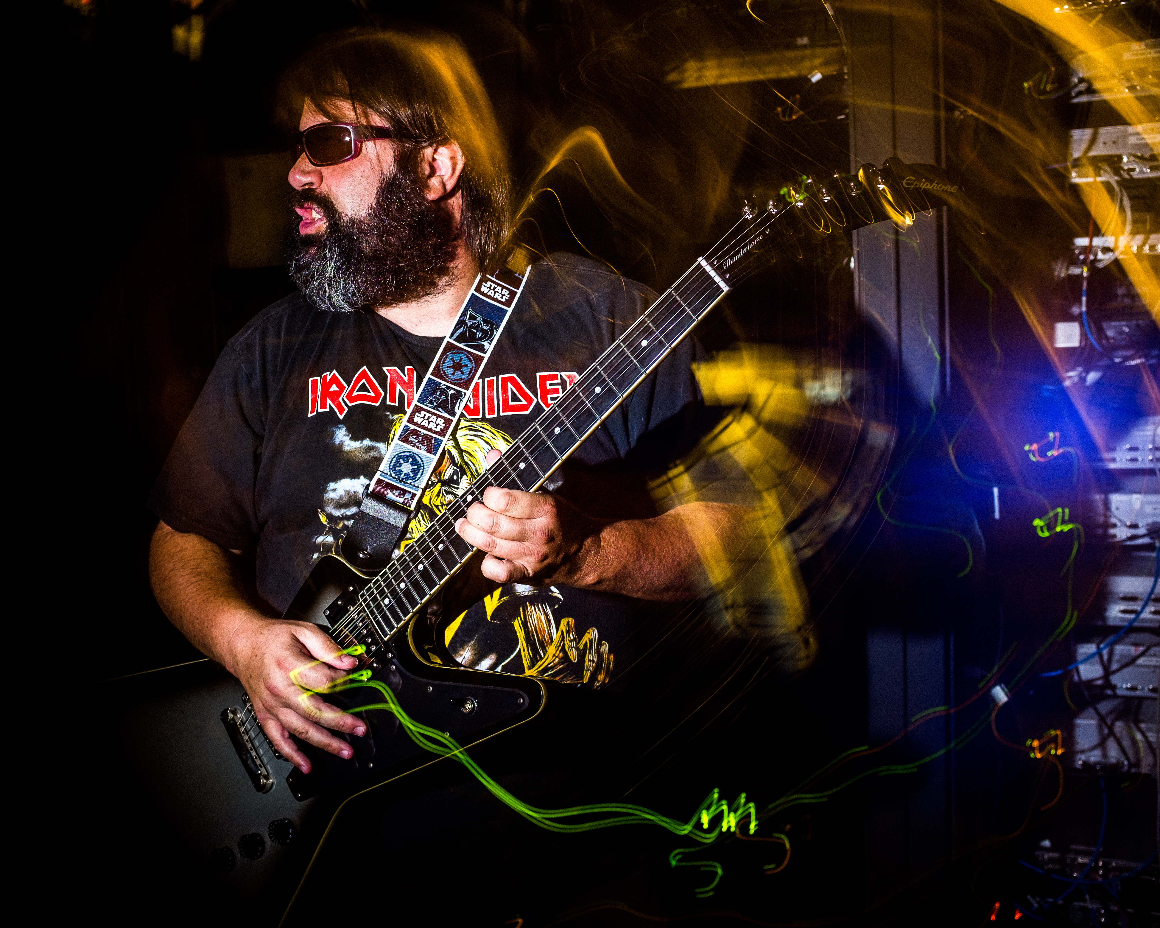 With electric guitar