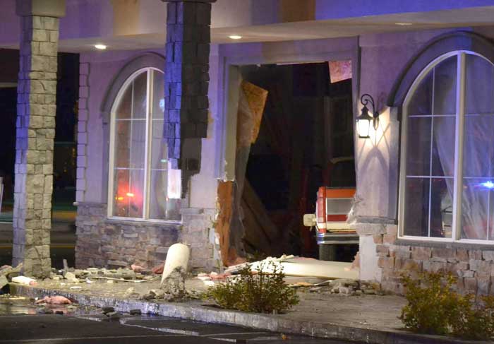 update man arrested after intentionally driving truck through