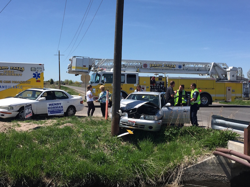 Crews investigating wreck after car crashes into power pole East
