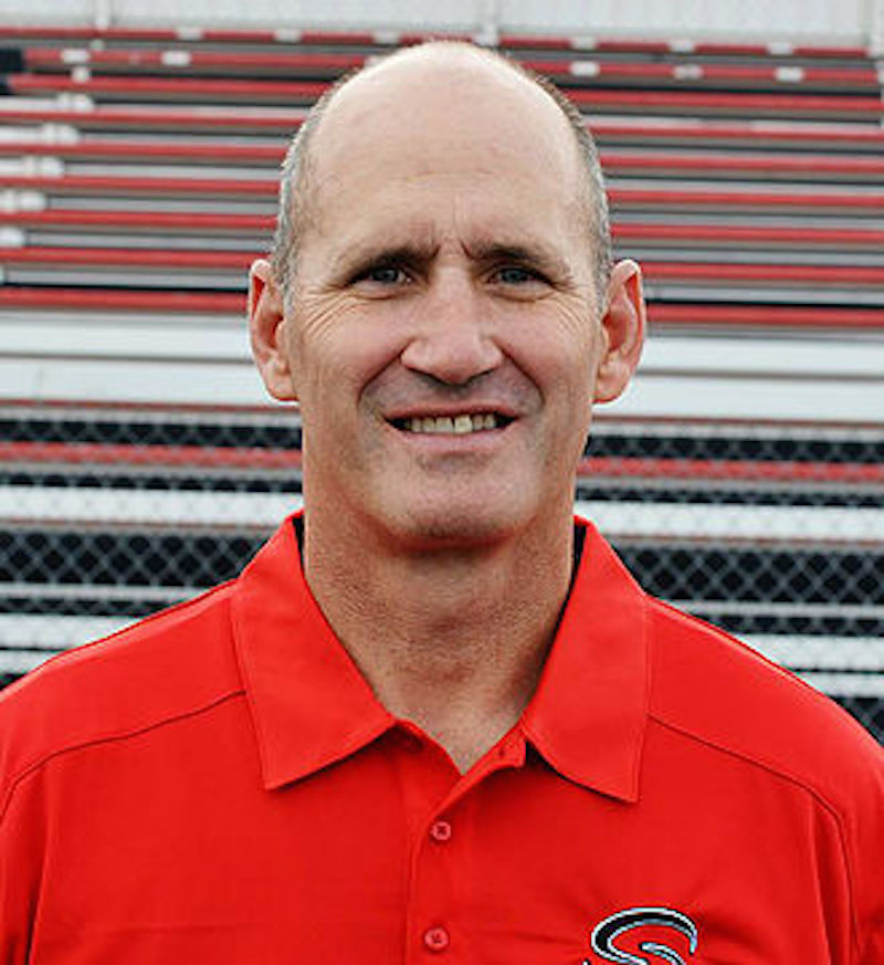 Shelley football coach surprised as district names field after him