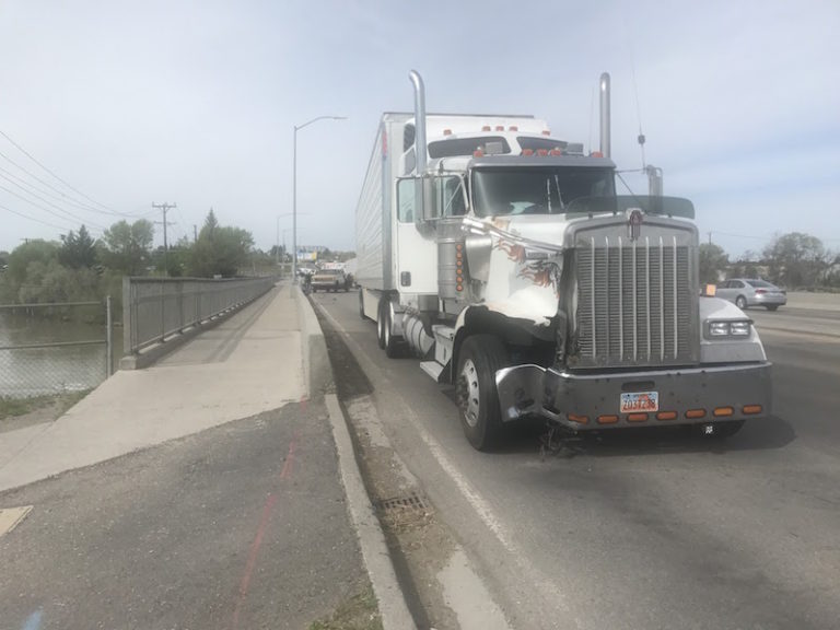 Wheel falls off truck, causes crash on US 20 bridge over Snake River