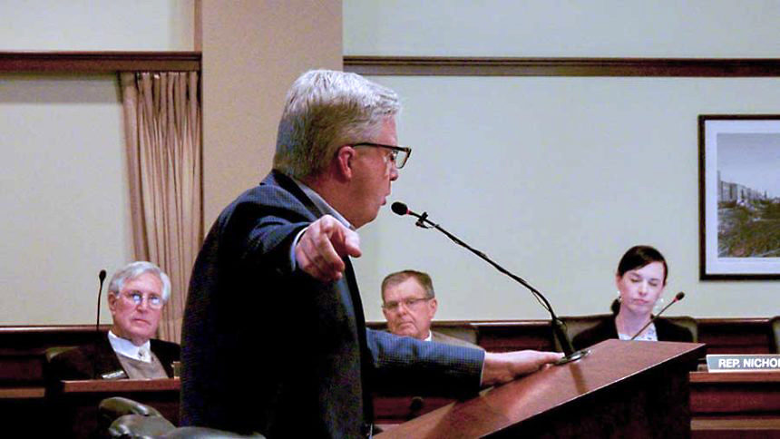 Bryan Smith points at EastIdahoNews.com reporters during a House committee hearing