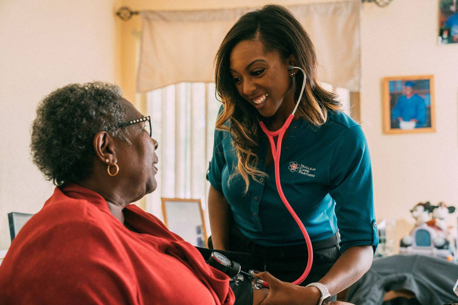 Home health service hosting drivethru celebration for