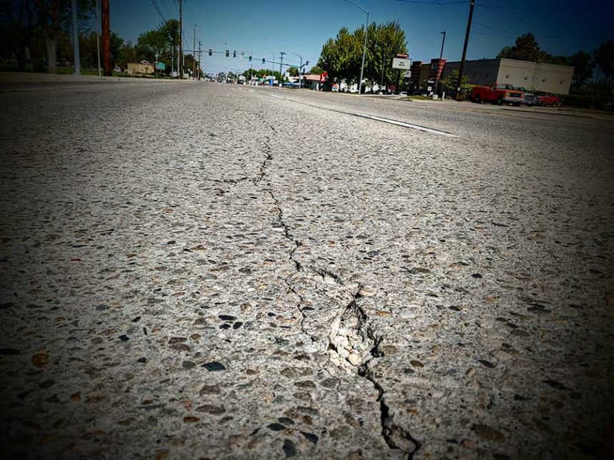 cracked asphalt in front of ITD building