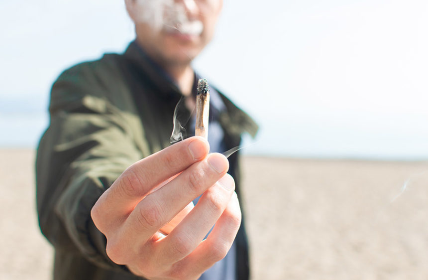 holding a joint