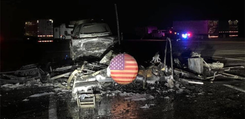 Flag unharmed during camper trailer fire 1