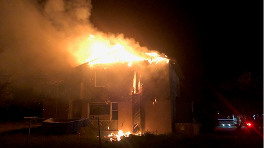 Firefighters find person on roof trying to put out house fire with garden hose - Vimarsana News