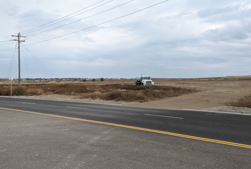 City limit sign, water truck and state-mandated easement